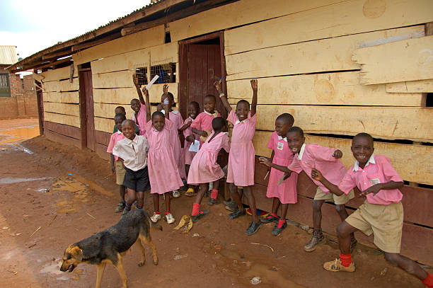 Children in pink school uniform. stock photo