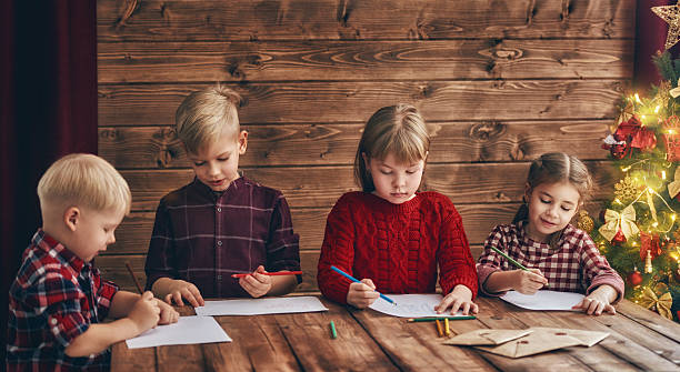 istock kids writing letters to Santa Claus 623513294