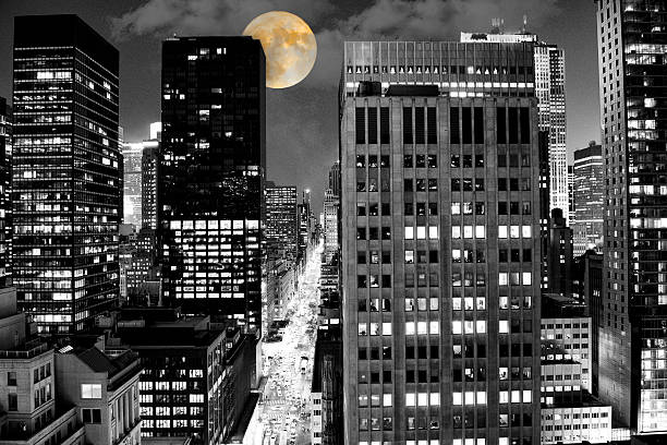 istock Full moon over 5th avenue, NYC. black and white 623516454