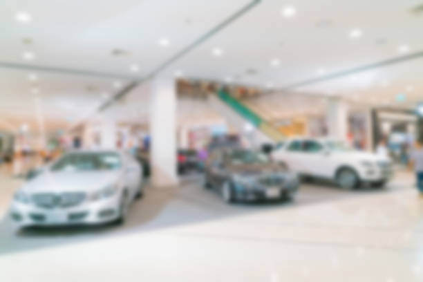 istock Abstract blurred photo of motor show 623516716