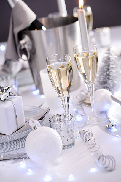 istock white silver new year eve christmas luxury restaurant table champagne 623517150