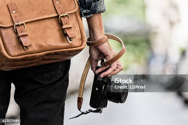 Photographer With Leather Bag In The City Stock Photo - Download Image Now - Photographer, Camera - Photographic Equipment, Journalist