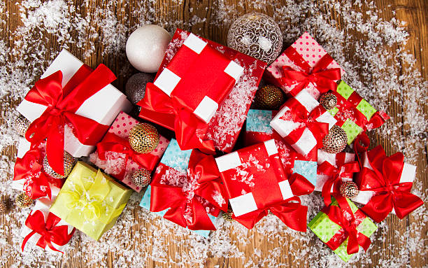 istock Christmastime celebration, Gift box with red ribbon bow 623520764
