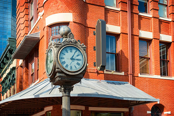 Street Clock in Downtown Fort Worth Texas USA Photo of an ornate street clock in downtown Fort Worth, Texas, USA. fort worth stock pictures, royalty-free photos & images