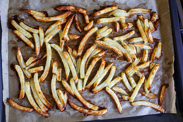 istock French fries on baking plate 623524236