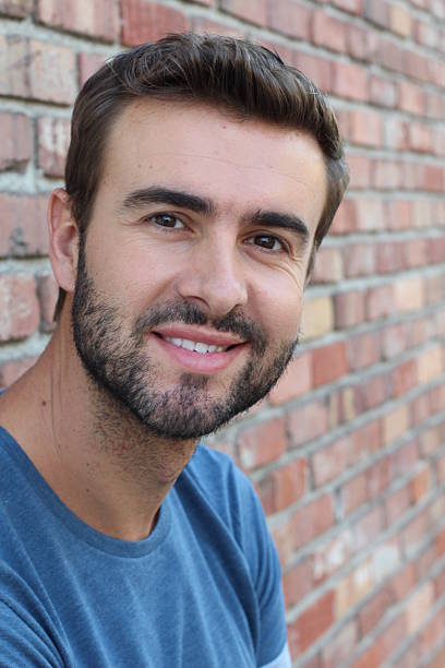 istock Natural handsome young man smiling 623526988