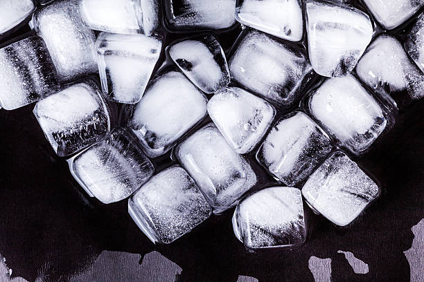 istock Texture of ice cubes on a dark background 623527976