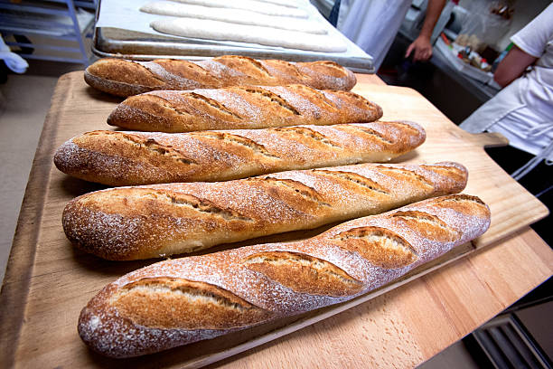 Close  View  Row of Freshly Baked Bread Baguette Loaves