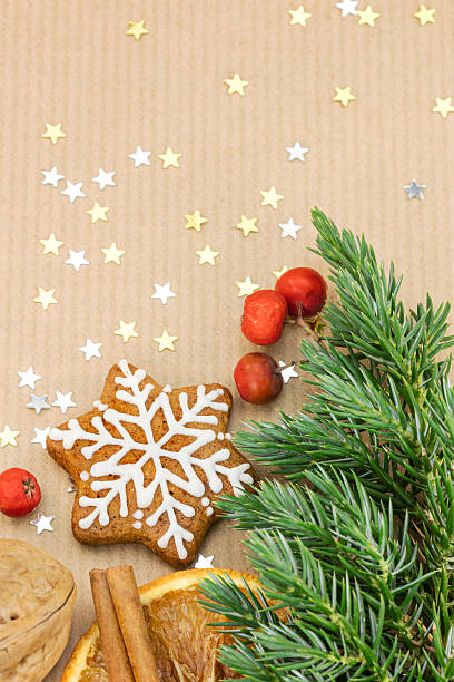 istock christmas cookies, spices, nut on brown wrapping paper 623530268