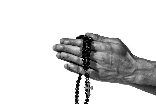 praying hands with rosary. - confessional nun imagens e fotografias de stock