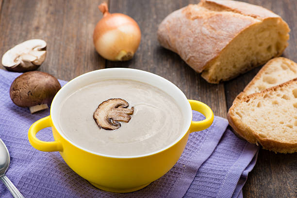 istock Mushroom cream soup on the wooden table. 623533794