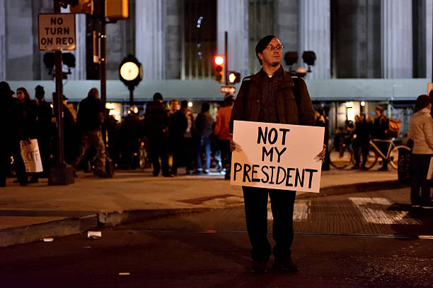 Anti-Trump Protest following U.S. Elections in Philadelphia, PA Philadelphia, Pennsylvania, United States - November 10, 2016: 1.000 protest the results of the 2016 U.S. Elections during a second consecutive day of Anti-Trump demonstrations in Center City, Philadelphia, PA. president photos stock pictures, royalty-free photos & images