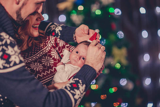 istock Family decorating a Christmas tree 623536804