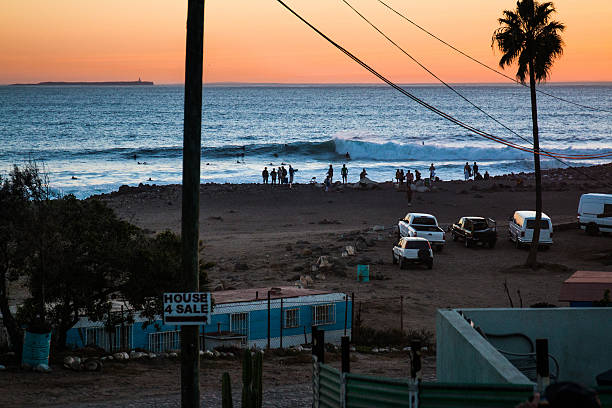 sunset sunset over a famous surfbreak in Mexico san miguel de cozumel stock pictures, royalty-free photos & images