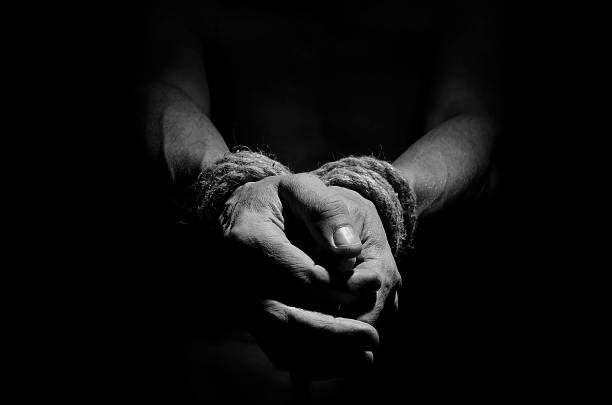 Man who wants freedom. Man with a rope tied his hands hostage photos stock pictures, royalty-free photos & images