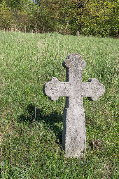 istock Cross on old cemetery 623537386