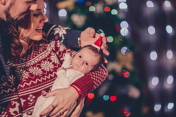 istock Family decorating a Christmas tree 623537844