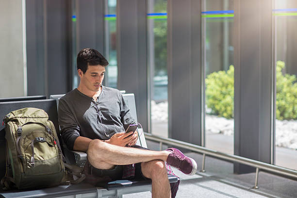 istock Single traveller waiting in airport terminal 623537954