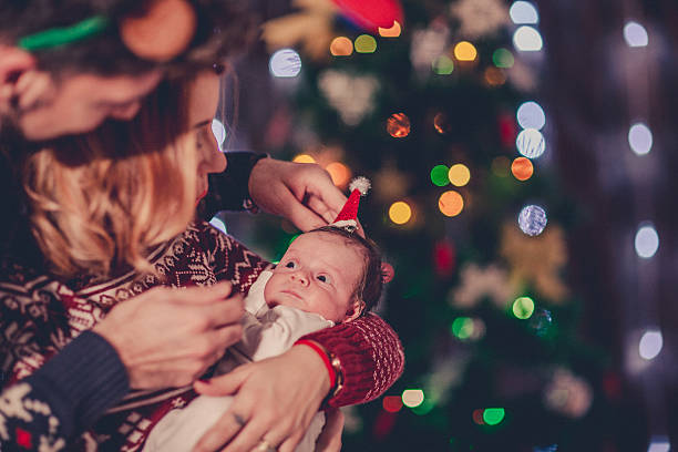 istock Family decorating a Christmas tree 623538858