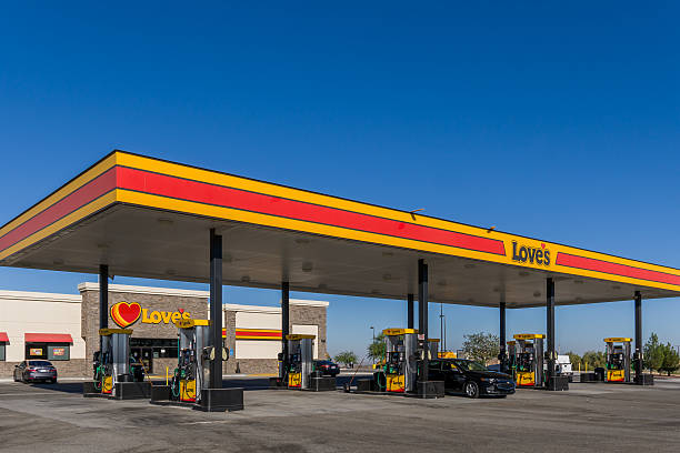 Love's Gas Station Exterior and Sign Barstow, United States - October 1, 2016: Love's gas station exterior and logo. Love's Travel Stops & Country Stores is a chain of more than 390 truck stops. loves truck stop stock pictures, royalty-free photos & images