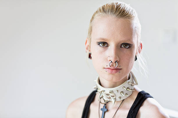 A studio portrait of a serious teenage girl.