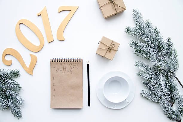 istock Plans for new year on white background top view 623588322