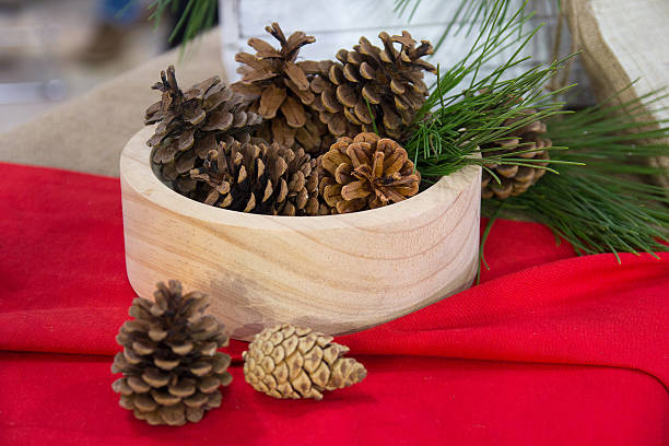istock Pine cones in a wooden bowl. Christmas decorations 623588364