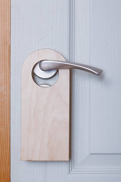 istock Closed door with do not disturb sign 623589740