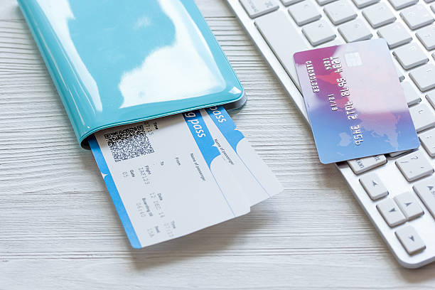 istock credit card on keyboard - buy tickets online 623591930