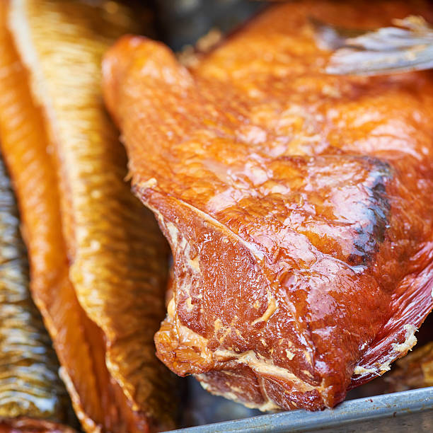 istock Set of smoked fish in a tin pan 623592404