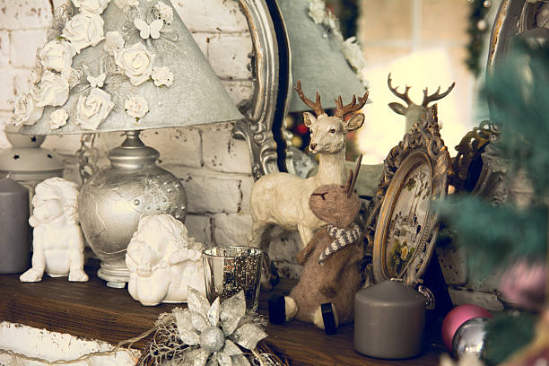 istock Shelf with mirror lamp candles, angels 623599732