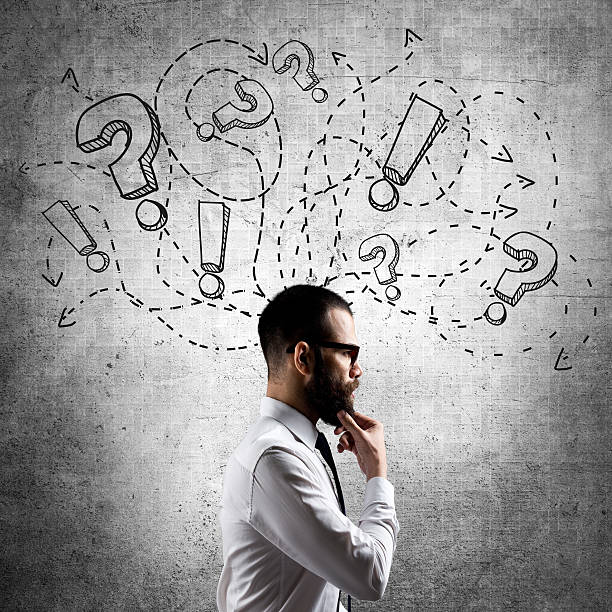 Confused and stressed businessman