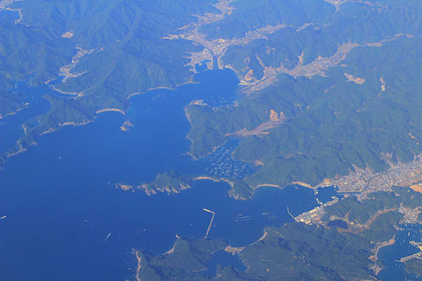istock View of the ground from airplane window 623606188