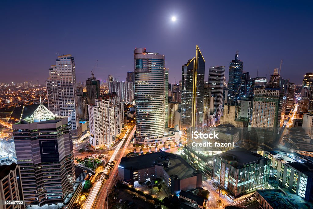 Makati Skyline, Metro Manila - Philippines Makati Skyline at night. Makati is a city in the Philippines` Metro Manila region and the country`s financial hub. It`s known for the skyscrapers and shopping malls. Manila - Philippines Stock Photo
