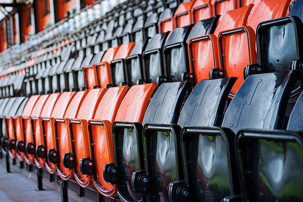 istock Rows of black and red plastic stadium seats 623607884