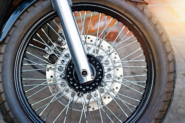 istock motorcycles wheel on the street 623611014