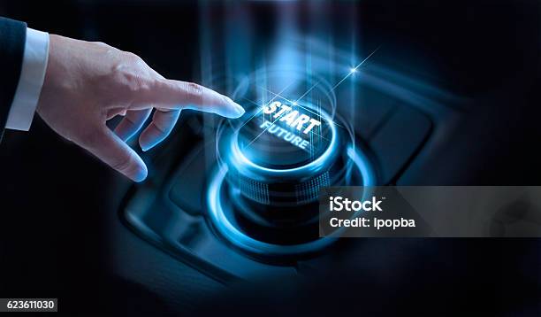 Businessman Press Start Future Button With Virtual Light Dark Background Stock Photo - Download Image Now