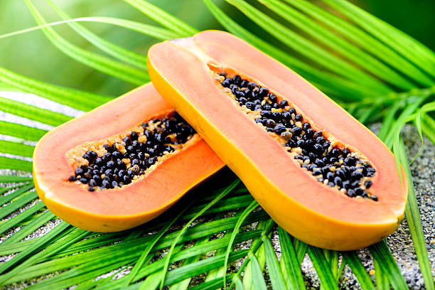 Fresh  Papaya Half  Sliced Fresh Papaya papaya stock pictures, royalty-free photos & images