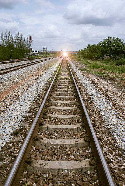 istock junction of railway with tree at left and right side 623612200