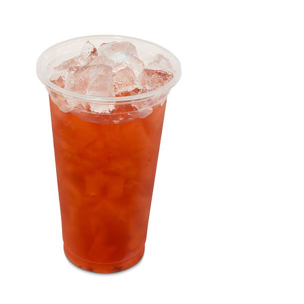 istock ice tea roselle in takeaway glass on white with path 623612458