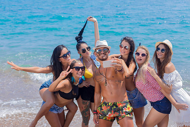 istock Friends taking a selfie on the beach. 623614922