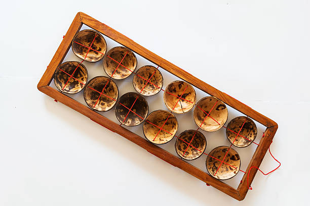 istock coconut shell in wooden frame, self-foot massage 623618804