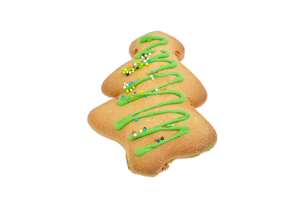 istock Cookie in the form of Christmas tree on light background 623621726