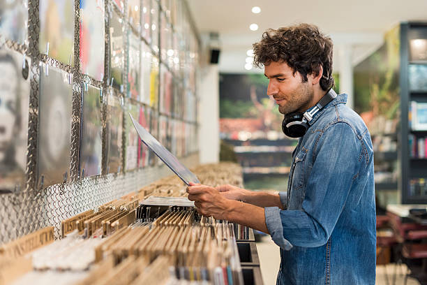 istock Man browsing vinyl album in a record store 623622068