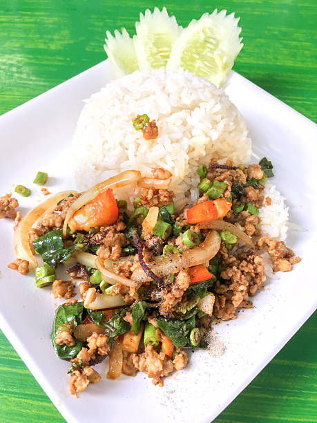 istock Thai food , stir-fried pork and basil served with rice 623622262
