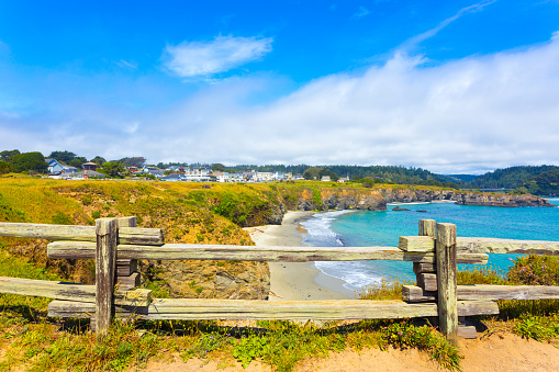 Wide view of waves crashing on shore rocks of Garrapata Beach.\n\nTaken at Garrapata Beach, Big Sur, California, USA