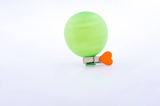 istock Clothespin with a heart and a balloon 623676668