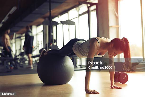 Beautiful Woman Training In Gym Stock Photo - Download Image Now - Pilates, Sports Ball, Gym