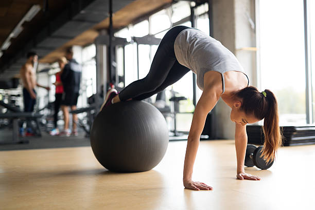 istock Beautiful woman training in gym 623681670