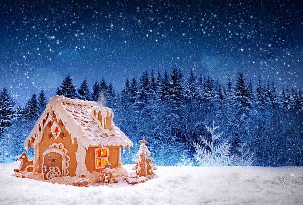 istock Christmas Gingerbread house and snowfall. 623684642